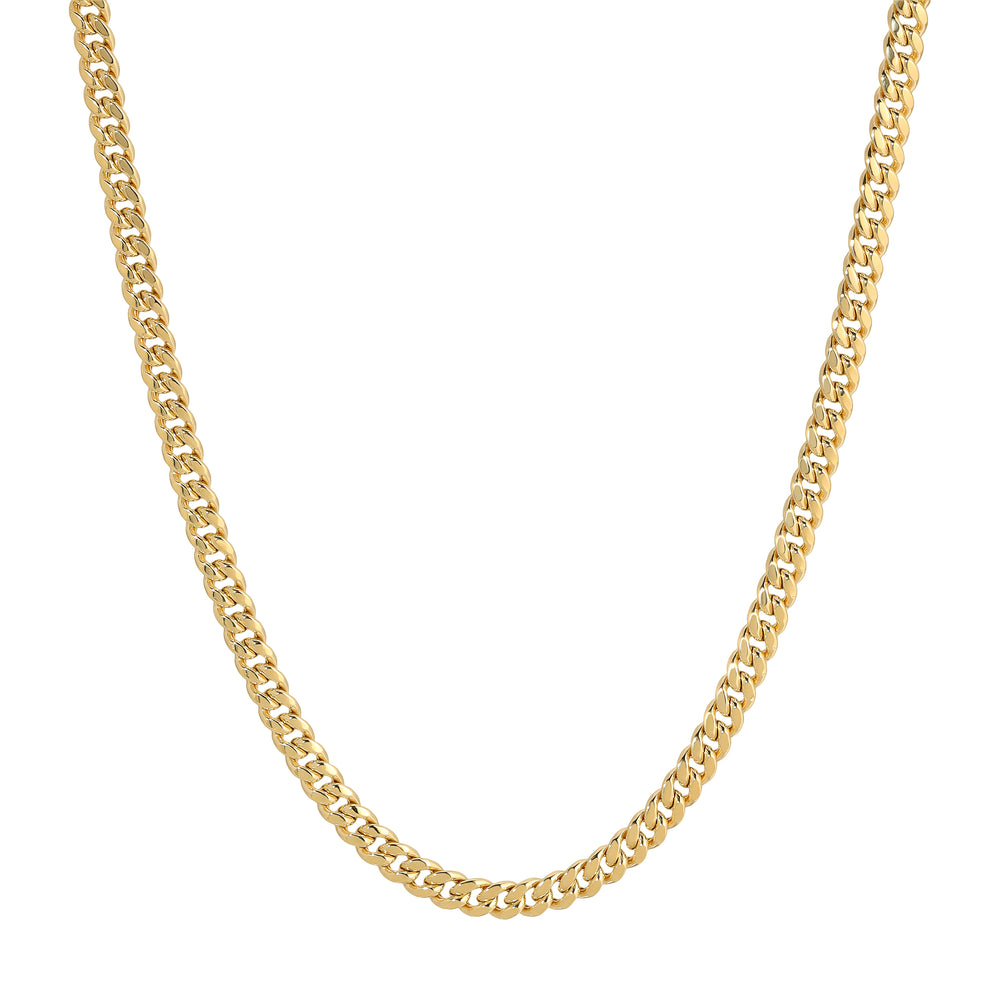Close-up of a 14K real hollow yellow gold Miami Cuban chain