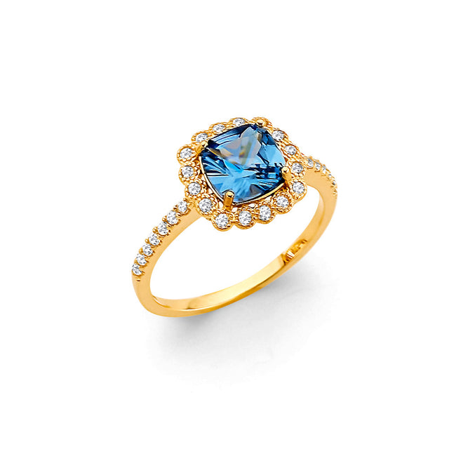 14K Yellow Gold Blue Cushion Floral Halo Ring on White Background