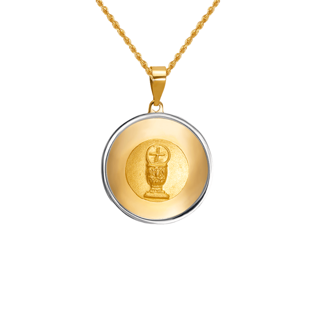 14K two-tone gold communion pendant featuring a detailed chalice and host design on a polished background.