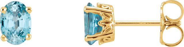 14K Gold Natural Blue Zircon Oval 4-Prong Scroll Setting Stud Earrings - Yellow Gold