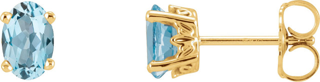 14K Gold Natural Sky Blue Topaz Oval 4-Prong Scroll Setting Stud Earrings - Yellow Gold