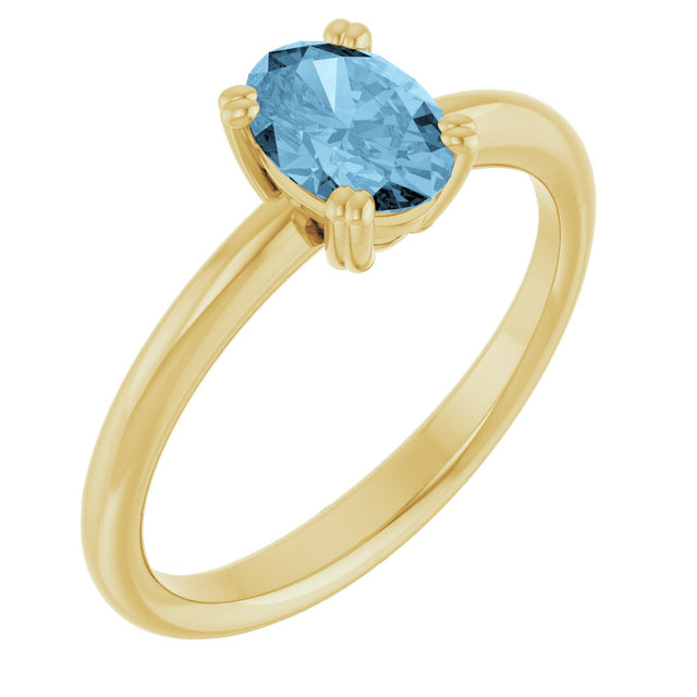 10K Gold Oval Natural Sky Blue Topaz Double-Prong Ring - Yellow Gold