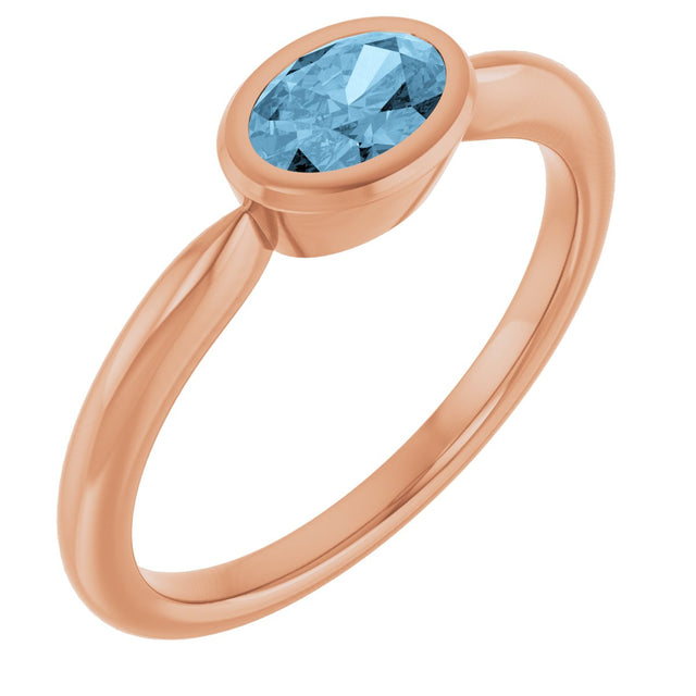 14K Gold Oval Natural Sky Blue Topaz Bezel-Set Solitaire Ring - Rose Gold