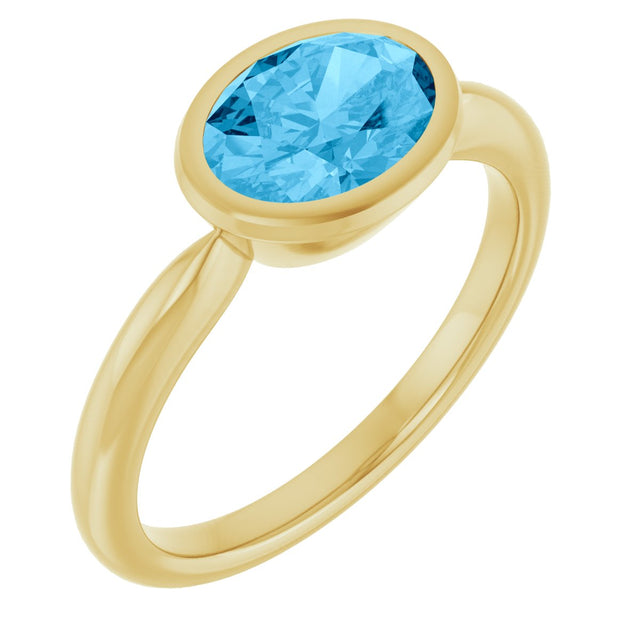 14K Gold Oval Natural Swiss Blue Topaz Bezel-Set Solitaire Ring - Yellow Gold