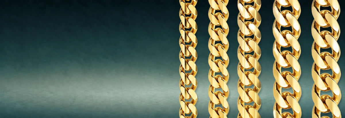 Yellow gold Miami Cuban link chains on a dark teal background