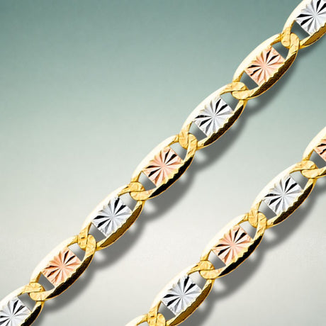 10K yellow two-tone gold diamond cut Valentino chain showing delicate links with full-length sparkle