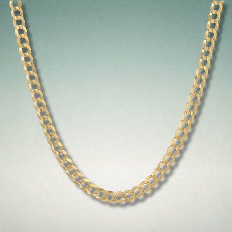 10K hollow Cuban chain showing wide interlocking polished links with bold gold shine