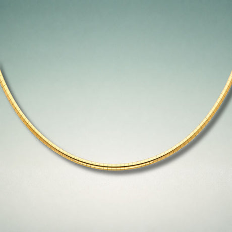 Omega solid gold necklace showing smooth flat ribbon-like links forming a structured gold collar