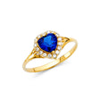 14K Yellow Gold Heart-Shaped Blue Center Stone Halo Ring on White Background