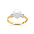 14K Yellow Gold Pearl Three-Stone Ring on White Background