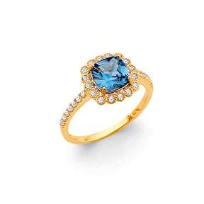 14K Yellow Gold Blue Cushion Floral Halo Ring on White Background