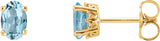 14K Gold Natural Sky Blue Topaz Oval 4-Prong Scroll Setting Stud Earrings - Yellow Gold