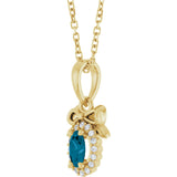 14K Gold Oval Natural London Blue Topaz & Natural Diamond Accented Bow Necklace or Pendant - Yellow Gold - view 2