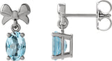 14K Gold Oval Natural Sky Blue Topaz Solitaire Bow Earrings - White Gold