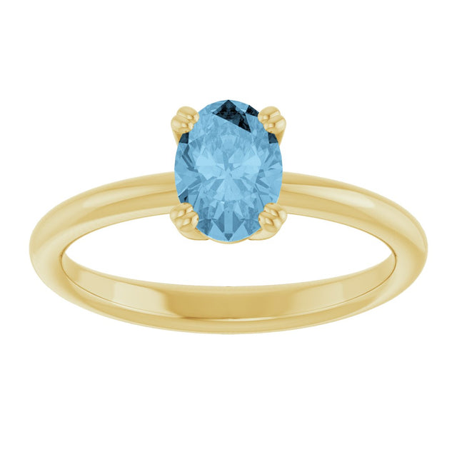 10K Gold Oval Natural Sky Blue Topaz Double-Prong Ring - Yellow Gold - view 3