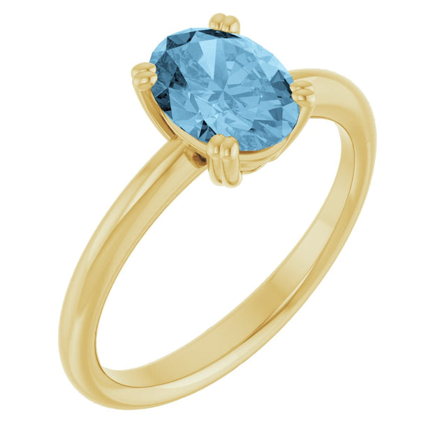 10K Gold Oval Natural Sky Blue Topaz Double-Prong Ring - Yellow Gold