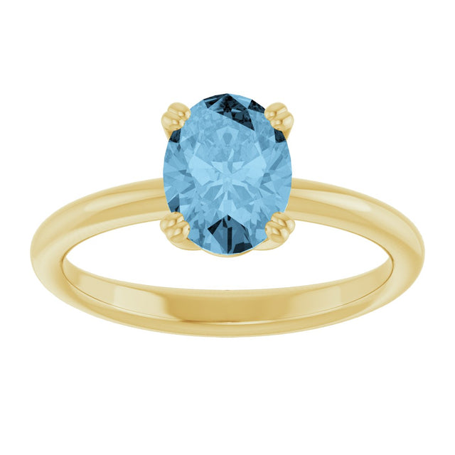 10K Gold Oval Natural Sky Blue Topaz Double-Prong Ring - Yellow Gold - view 3