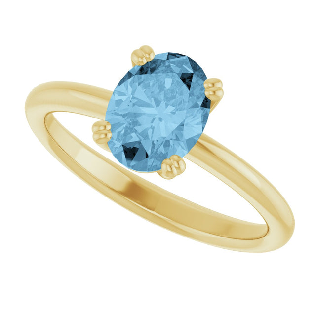 10K Gold Oval Natural Sky Blue Topaz Double-Prong Ring - Yellow Gold - view 5