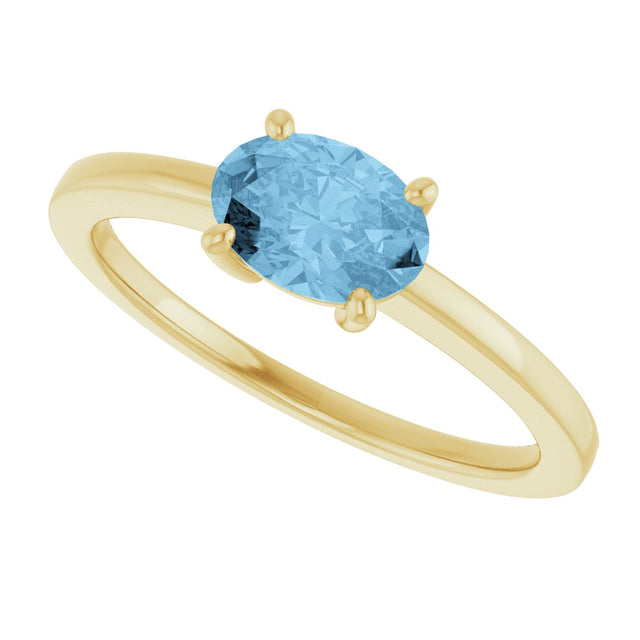 10K Gold Oval Natural Sky Blue Topaz Solitaire Ring - Yellow Gold - view 5