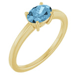 10K Gold Oval Natural Sky Blue Topaz Solitaire Ring - Yellow Gold
