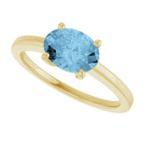 10K Gold Oval Natural Sky Blue Topaz Solitaire Ring - Yellow Gold - view 5