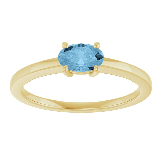 10K Gold Oval Natural Sky Blue Topaz Solitaire Ring - Yellow Gold - view 3