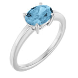 10K Gold Oval Natural Sky Blue Topaz Solitaire Ring - White Gold