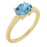 10K Gold Oval Natural Sky Blue Topaz Solitaire Ring - Yellow Gold