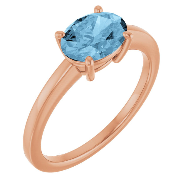14K Gold Oval Natural Sky Blue Topaz Solitaire Ring - Rose Gold