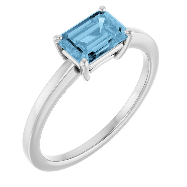 10K Gold Oval Natural Sky Blue Topaz Solitaire Ring - White Gold