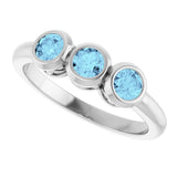 Platinum Round Natural Aquamarine Three-Stone Bezel-Set Ring - view 10