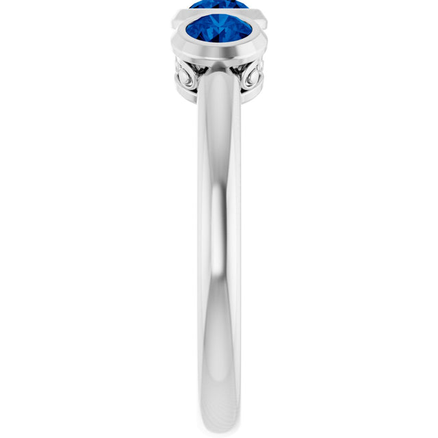 Platinum Round Natural Blue Sapphire Three-Stone Bezel-Set Ring - view 9