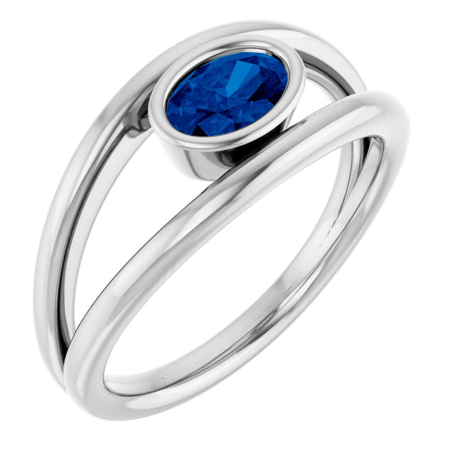 Platinum Oval Natural Blue Sapphire Bezel-Set Solitaire Negative Space Ring