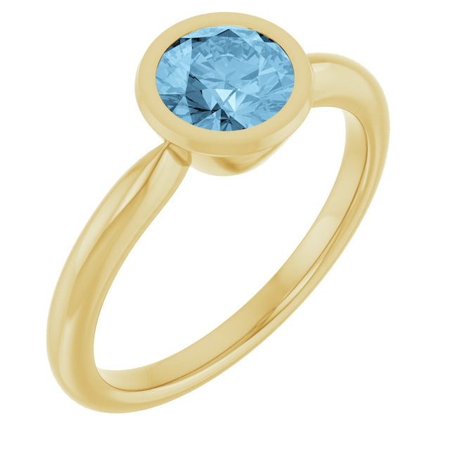 10K Gold Oval Natural Sky Blue Topaz Bezel-Set Solitaire Ring - Yellow Gold