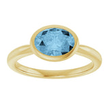 10K Gold Oval Natural Sky Blue Topaz Bezel-Set Solitaire Ring - Yellow Gold - view 3
