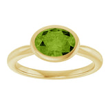 10K Gold Oval Natural Peridot Bezel-Set Solitaire Ring - Yellow Gold - view 3