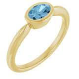 10K Gold Oval Natural Sky Blue Topaz Bezel-Set Solitaire Ring - Yellow Gold