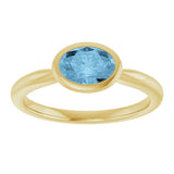 10K Gold Oval Natural Sky Blue Topaz Bezel-Set Solitaire Ring - Yellow Gold - view 3
