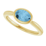 10K Gold Oval Natural Sky Blue Topaz Bezel-Set Solitaire Ring - Yellow Gold - view 5