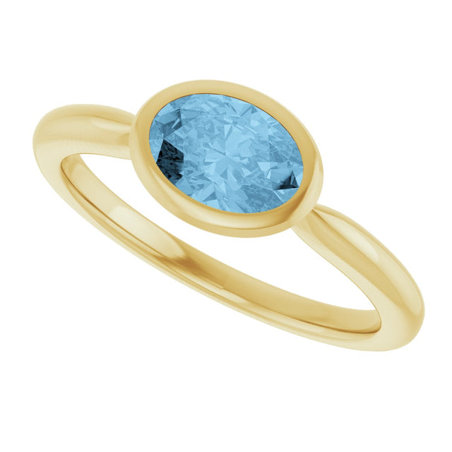 10K Gold Oval Natural Sky Blue Topaz Bezel-Set Solitaire Ring - Yellow Gold - view 5