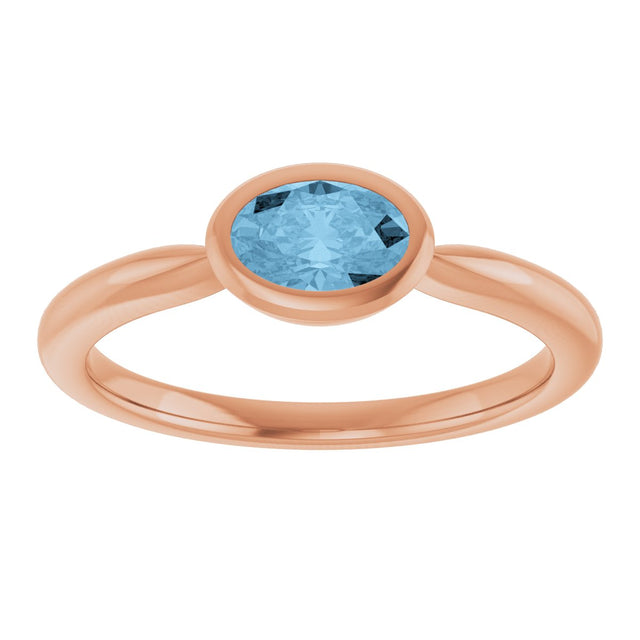 14K Gold Oval Natural Sky Blue Topaz Bezel-Set Solitaire Ring - Rose Gold - view 3
