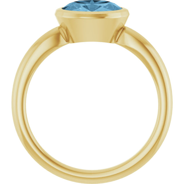 10K Gold Oval Natural Sky Blue Topaz Bezel-Set Solitaire Ring - Yellow Gold - view 2