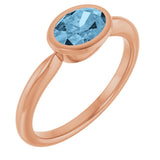 14K Gold Oval Natural Sky Blue Topaz Bezel-Set Solitaire Ring - Rose Gold