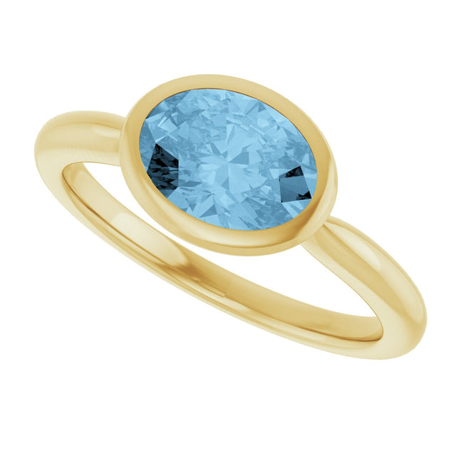 10K Gold Oval Natural Sky Blue Topaz Bezel-Set Solitaire Ring - Yellow Gold - view 5