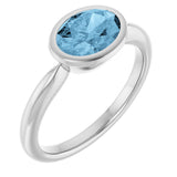 Platinum Oval Natural Sky Blue Topaz Bezel-Set Solitaire Ring
