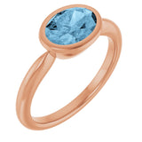 14K Gold Oval Natural Sky Blue Topaz Bezel-Set Solitaire Ring - Rose Gold