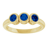 14K Gold Round Lab-Grown Blue Sapphire Three-Stone Bezel-Set Ring - Yellow Gold - view 3