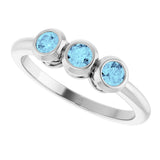 Platinum Round Natural Aquamarine Three-Stone Bezel-Set Ring - view 7