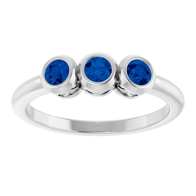 Platinum Round Natural Blue Sapphire Three-Stone Bezel-Set Ring - view 3