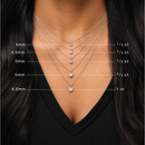 Stone size guide — round stones from 4 mm to 6.5 mm shown on the neck — 14K Gold Round Natural White Sapphire Youth Birthstone Necklace